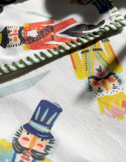 Holiday Tea Towel with Embroidered Detail | Nutcrackers